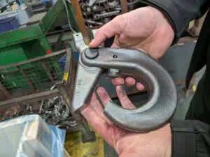 Crosby self-locking hook finishing and assembly
